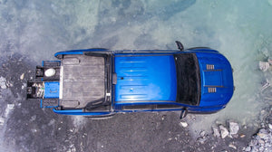 vista superior de una camioneta azul con un cajón abierto en la parte delantera Bed Truck