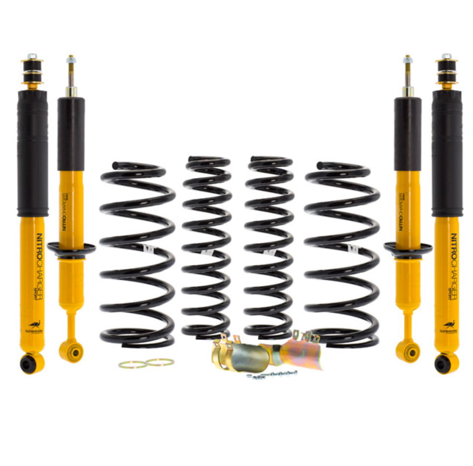 ome kit de suspensión amarillo y negro con 4 muelles y 4 amortiguadores sobre fondo blanco